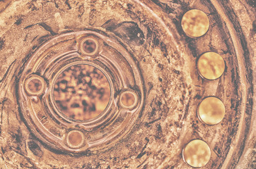 Part of  old rusty scratched automobile wheel as background.Closeup shoot