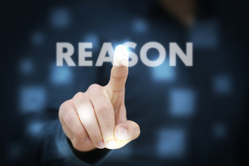 Businessman touching Reason