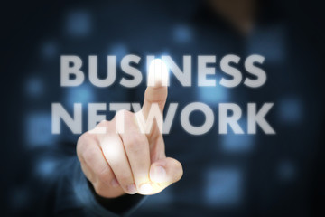 Businessman touching Business Network