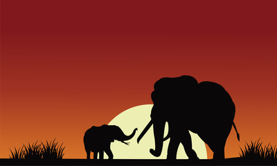 Silhouette of elephant with sun