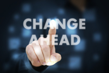 Businessman touching Change Ahead