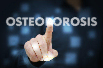 Businessman touching Osteoporosis