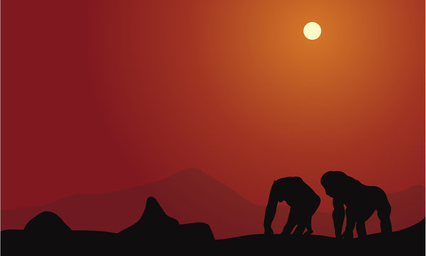 Silhouette of gorilla with mountain backgrounds