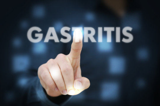 Businessman touching Gastritis
