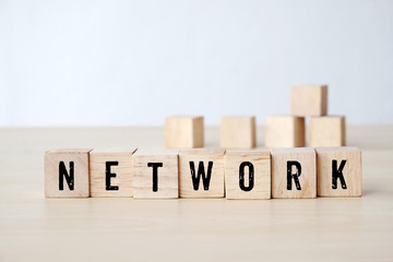 Network word on wooden cubes background