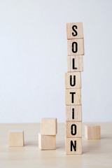 Solution word on wooden cubes background