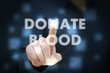 Businessman touching Donate Blood