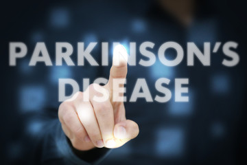 Businessman touching Parkinson's Disease