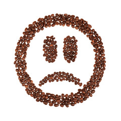 Anti smile shaped coffee beans isolated on white background