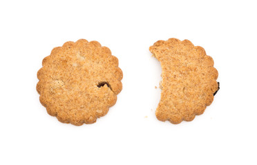 bited and intact crispy crackers with raisin on white