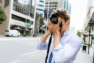 Male photographer taking picture