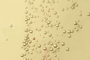 Golden fizz bubbles