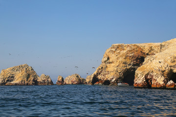 Fototapeta na wymiar Rock formations in Ballestas Islands Reserve in Peru
