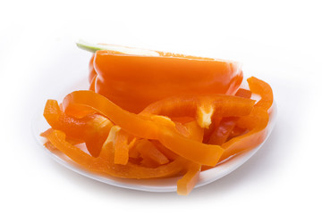 Red peppers slices isolated on white 
