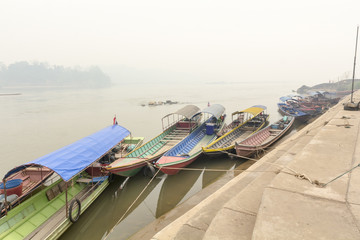 Heavily polluted air from forest fire cover Mekong river, Chiangkhong