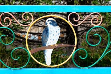 parrot in fence decoration