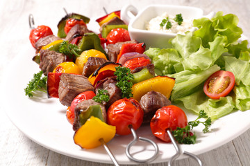fried beef with salad