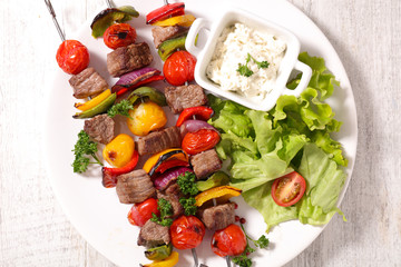 fried beef with salad