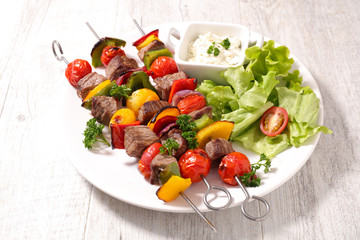 fried beef with salad