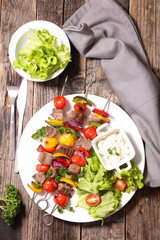 fried beef with salad