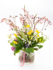 beautiful bouquet of bright wild flowers and lily isolated on white