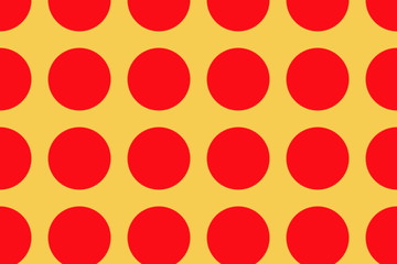 orange background with large red dots