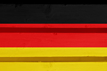 flag of Germany painted on wooden wall