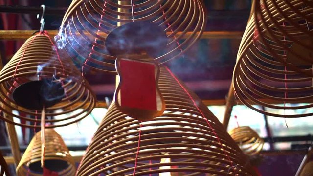 Chinese temple in Hong Kong iconic lanterns and Incense coils 