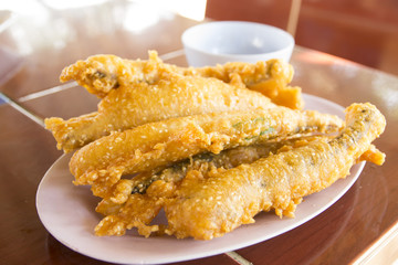 Fish fried on a plate for eating food - 109199703