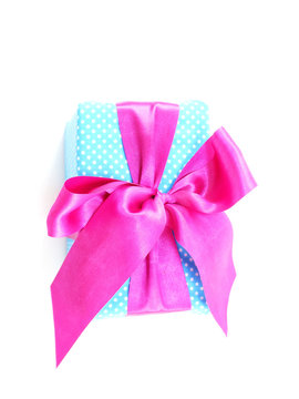 blue gift box with pink bow isolated on white background
