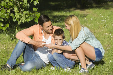 Happy family outdoors on a sunny day