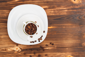 White dishware with coffee beans