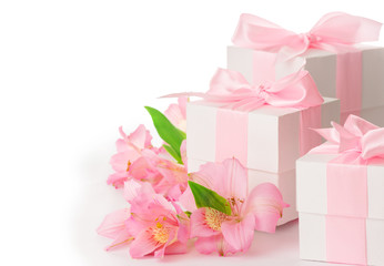 Festive composition of flowers and gifts