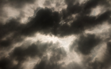 Obraz premium dark gray dramatic sky with large clouds.