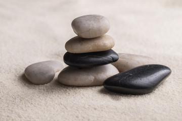 Fototapeta na wymiar zen stones on the sand