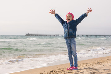 Seven-year girl rejoices arrival of the sea