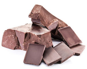 Chocolate blocks and pieces of chocolate bar isolated on a white