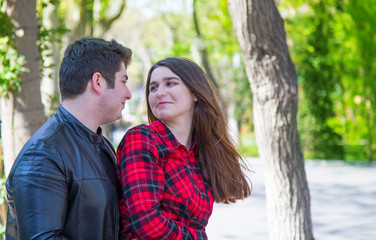 Naklejka premium boy and girl on the nature