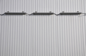Sheet metal, corrugated wall building