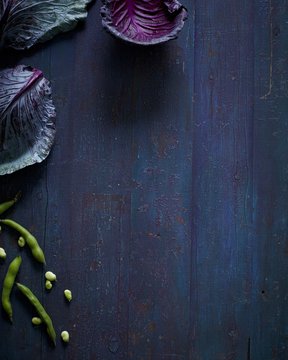 Overhead still life with seasonal cabbage and green beans