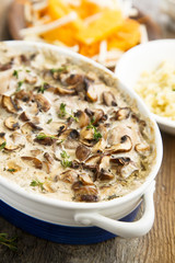 Chicken with mushrooms, bulgur and salad