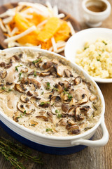 Chicken with mushrooms, bulgur and salad