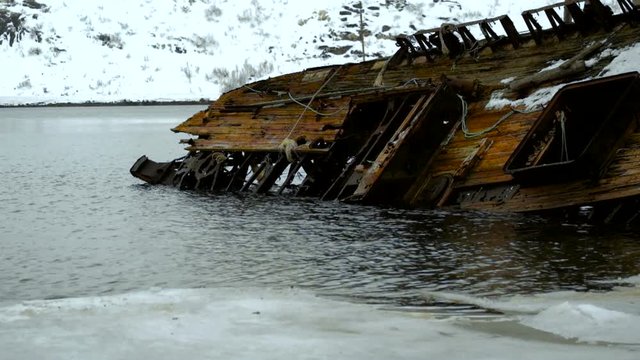 The old ship lies in the sea