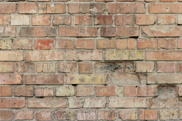 a fragment of a brick wall