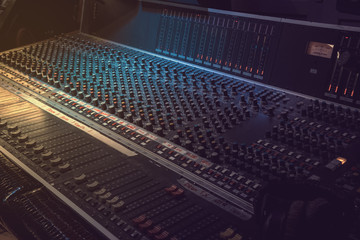 Sound recording equipment. Music mixer controls. Soft photo