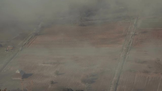Aerial high angle greek farm fields overview.Aerial high angle view of Greek fields in the morning in mist and fog