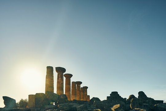 Remains of the Temple of Heracles, Valley of Temples at dusk, Agrigento, Sicily, Italy