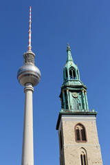Fototapeta na wymiar Television tower and St. Mary's Church in Berlin, Germany