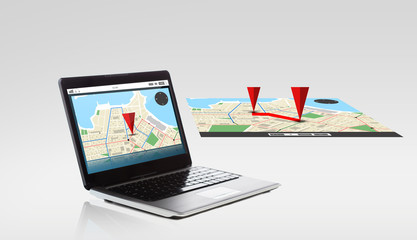 laptop computer with gps navigator map on screen