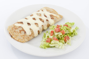 Delicious burrito brunch of sausage  on white plate